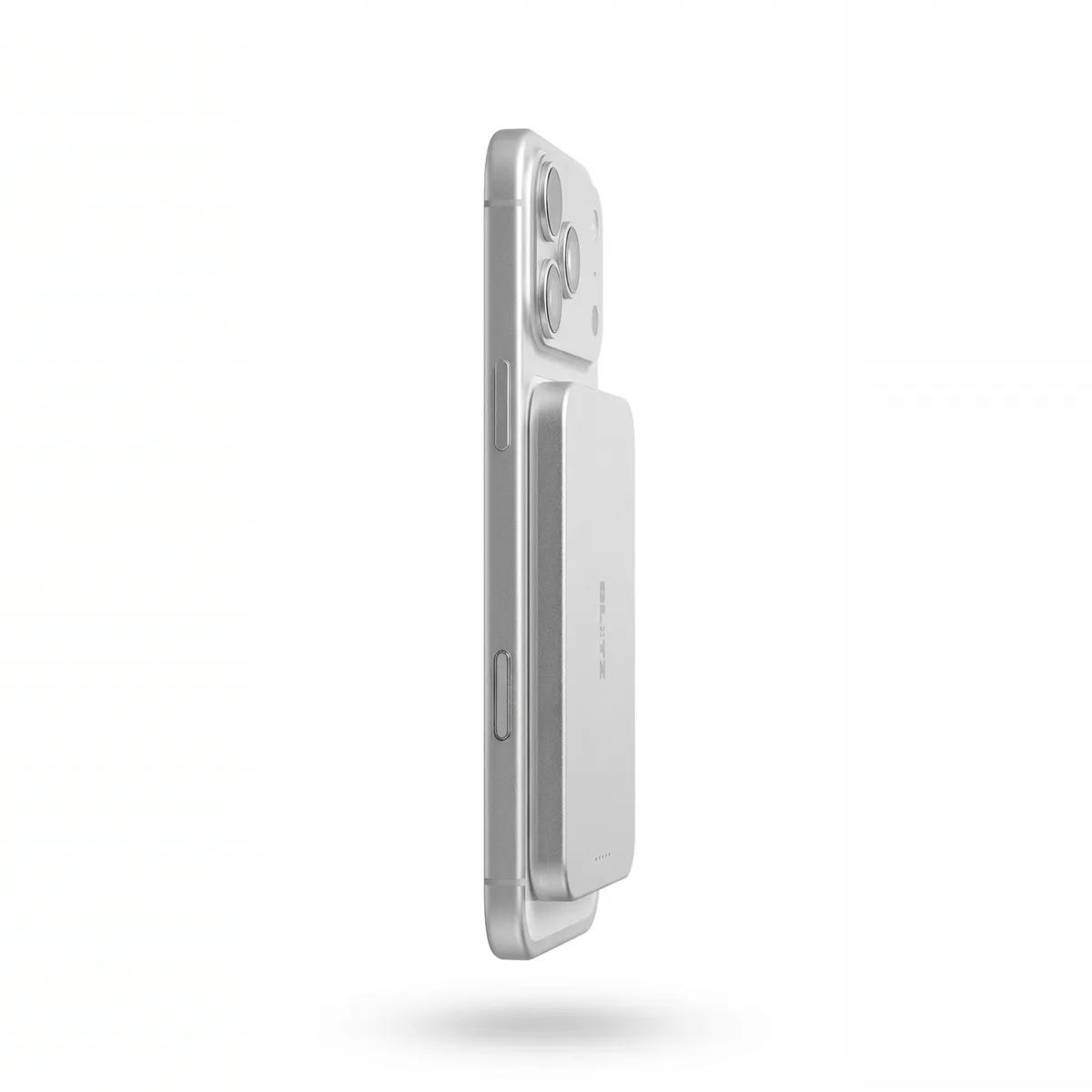 Side view of a phone with the slim silver power bank attached, floating on white